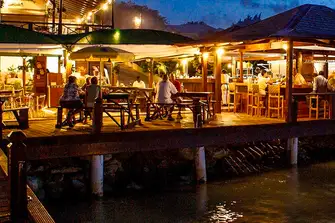 The wharves and quays buzz with Antiguan spirit as the sun sets