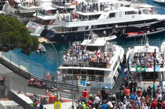 Feel the action in every sense on a trackside superyacht