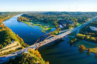 Beyond Pennybacker Bridge, the Austin Country Club course runs down to the edge of Lake Austin on the Colorado River