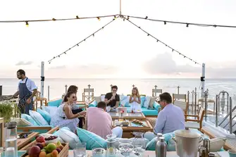 The sun deck is a great place to enjoy cocktails as the sun sets and the chef serves up deliciousness