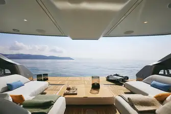 Her fold-down transom creates a swim platform from the beach club