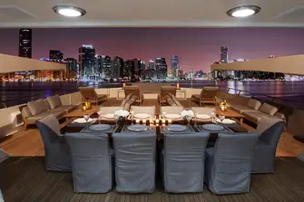 The upper deck aft has a large space ideally suited to entertainment. It also serves as the boat deck when underway, hence the two deck cranes