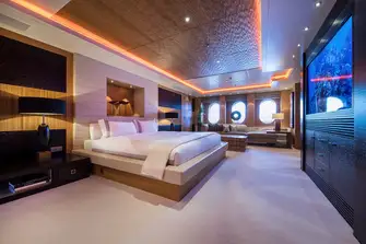 The full-beam owner's suite is forward on the main deck