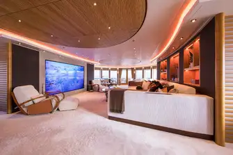 Looking aft from the sky lounge bar across the media lounge to the gaming tables