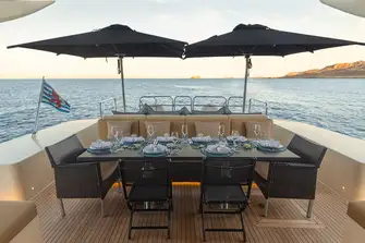 Al fresco dining forward of the generous sunpad aft