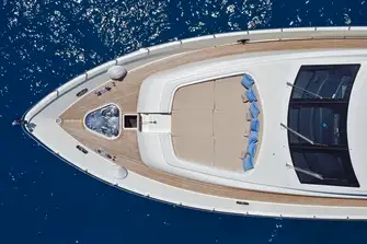 Walkaround sidedecks lead forward to a huge foredeck sunpad