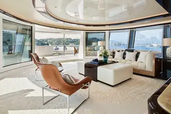 The owner's lounge overlooks a private terrace with jacuzzi, sunpads and an intimate dining area