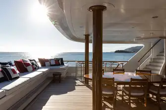 Open-air dining on the bridge deck aft