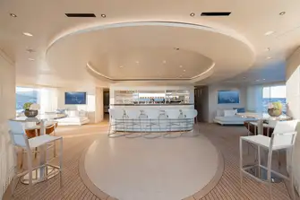 The huge beach club has a sit-up wet bar, lounge seating, along with two terraces and a swim platform for sea-level sun lounging