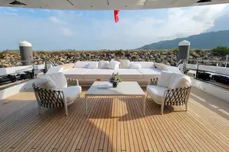 Seating and sun lounging on the main deck aft