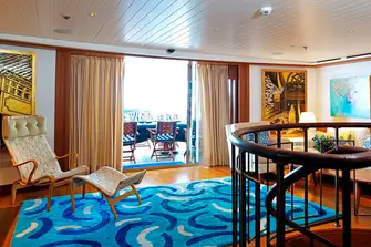 The seating and spiral staircase in the sky lounge