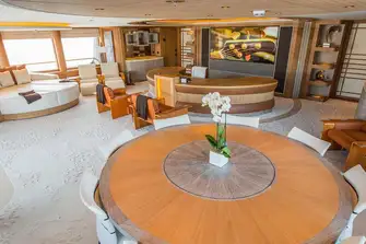 The owner's private office. Curved screens revolve around the desk for privacy