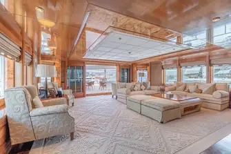 The sky lounge is well illuminated by natural light through large windows