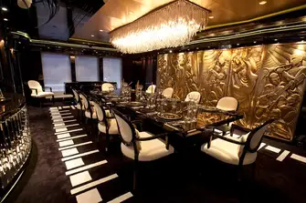 Prohibition-era entertainment literally lines the walls in the main deck's formal dining area