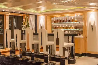 The upper deck's skyscraper bar services the lounge in 1920s Manhattan style