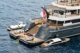 The huge swim platform, easily large enough for an ocean-side dinner party, has hydraulic bathing steps for ease of access to the water
