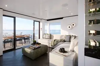 Outside the sky lounge there is open-air dining, a BBQ, walkaround sidedecks and lounge seating forward