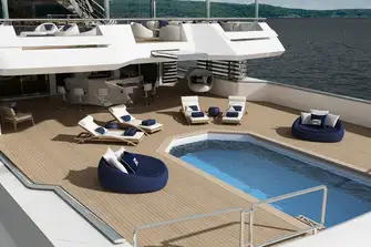 A vast pool with plenty of sun lounging space and a bar to keep the refreshments coming