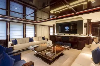 Forward of the jaw-dropping bar is a lounge area that doubles as a cinema with a huge drop-down screen. There is formal dining forward