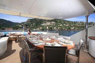 The upper deck aft has open-air dining with two buffet bars and lounge seating aft