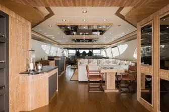 Looking forward into the Balducci-designed main saloon with its gaming table, lounge, bar and dining area