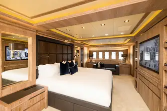 The lower deck owner's suite is full beam with an office adjacent