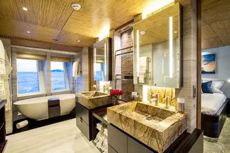 The owner's en suite has a bath to starboard and a shower room to port