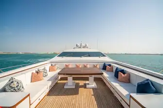 The foredeck lounge constitutes a third open-air dining area