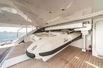 The 6m tender and two jetskis are stowed in the garage