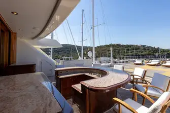 The forward sun deck has a large sun lounge with optional shade from removable awnings and aft is a sit-up bar and helipad