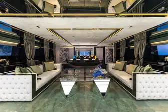 The sky lounge has lounge seating and a second formal dining area forward