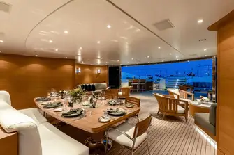 A huge sun deck has a pool, bar and lounge forward, a touch-and-go helipad aft and a lounge and dining area that can be climate controlled