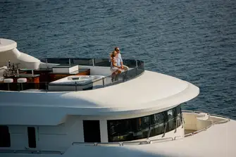 The sun deck has shaded lounge and dining areas, sit-up bar, jacuzzi and sunpads forward. There is tender and toy stowage aft and a deck crane for launching