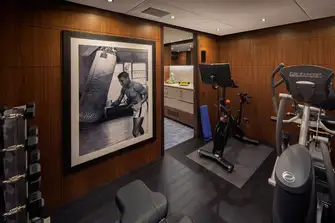 The air-conditioned gym on the bridge deck