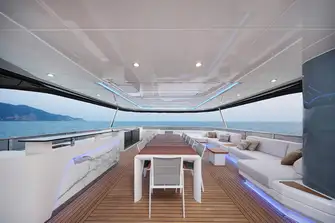 The forward section of the sun deck, with dining, bar and lounge, is shaded by the hardtop