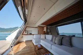 Sliding glass doors reveal the air-conditioned, sea-level beach club cabana
