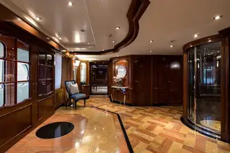 She has grand style, as seen here in the main deck elevator lobby, but she's never challenging