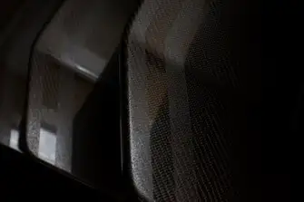 Immaculate carbon fibre work on the companionway steps is indicative of the yacht's build quality