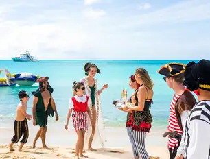 A pirate treasure hunt ends on a deserted beach with a BBQ