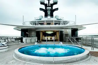 The large circular pool on the vast upper deck aft