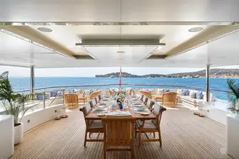 Open air dining on the upper deck aft