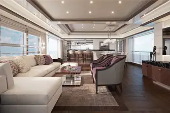 Looking forward in the main saloon with huge picture windows, across the lounge, formal dining area and bar