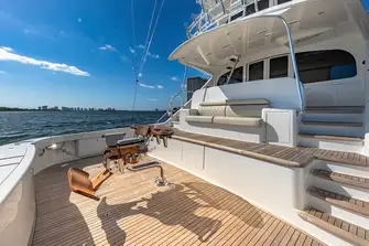The teak-decked fishing cockpit, where all the action happens, and open-air dining just up the steps