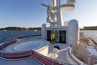 The jacuzzi forward on the sun deck and the gym under the hardtop