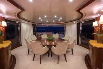 Looking aft in the upper deck dining area, surrounded by glass