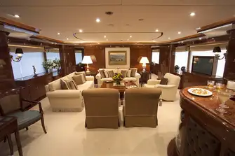 Looking forward in the main saloon with bar and lounge seating