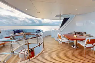 Lounge and intimate dining on the bridge deck aft