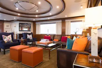 The main saloon has a large seating area delivering uninterrupted views through picture windows