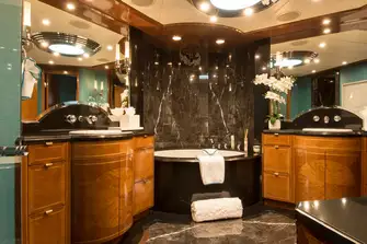 The owner’s bathroom has a skylight to deliver ample natural light
