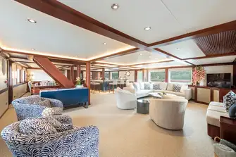 The Great Room with formal dining and sit-up bar forward and lounge areas aft